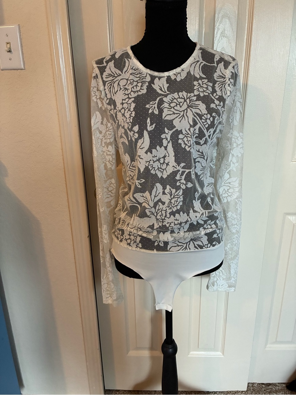 Ces Femme Sheer White Floral Lace Long Sleeve Bodysuit